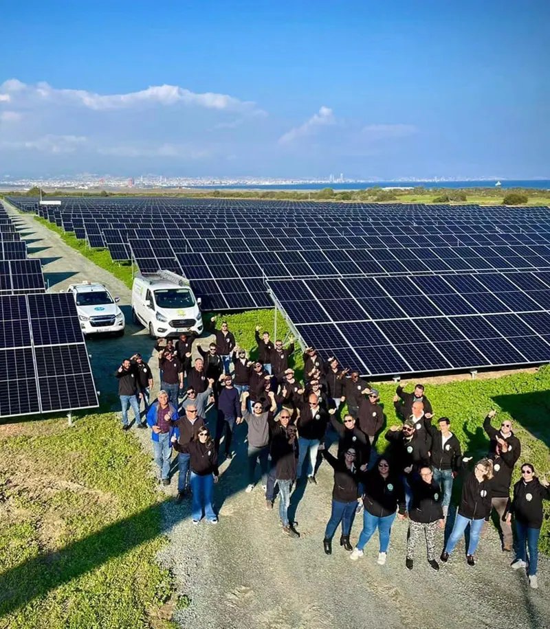 The CM Solar team on a solar plant built on CM structures